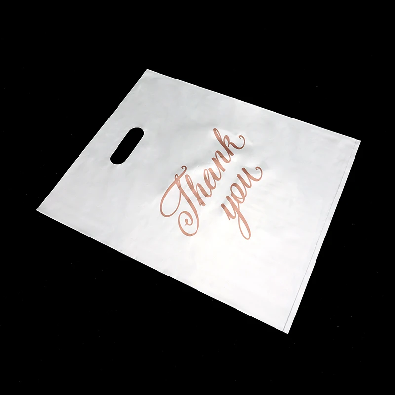 Custom Bags With Logo Plastic Waterproof Cloth Retail Shopping Bag Luxury Printed Die Cut Die cut handle bag
