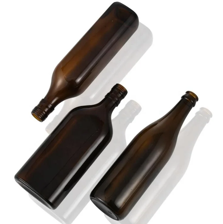 Wholesale Most popular amber drink 500 ml 16 oz glass beer bottle
