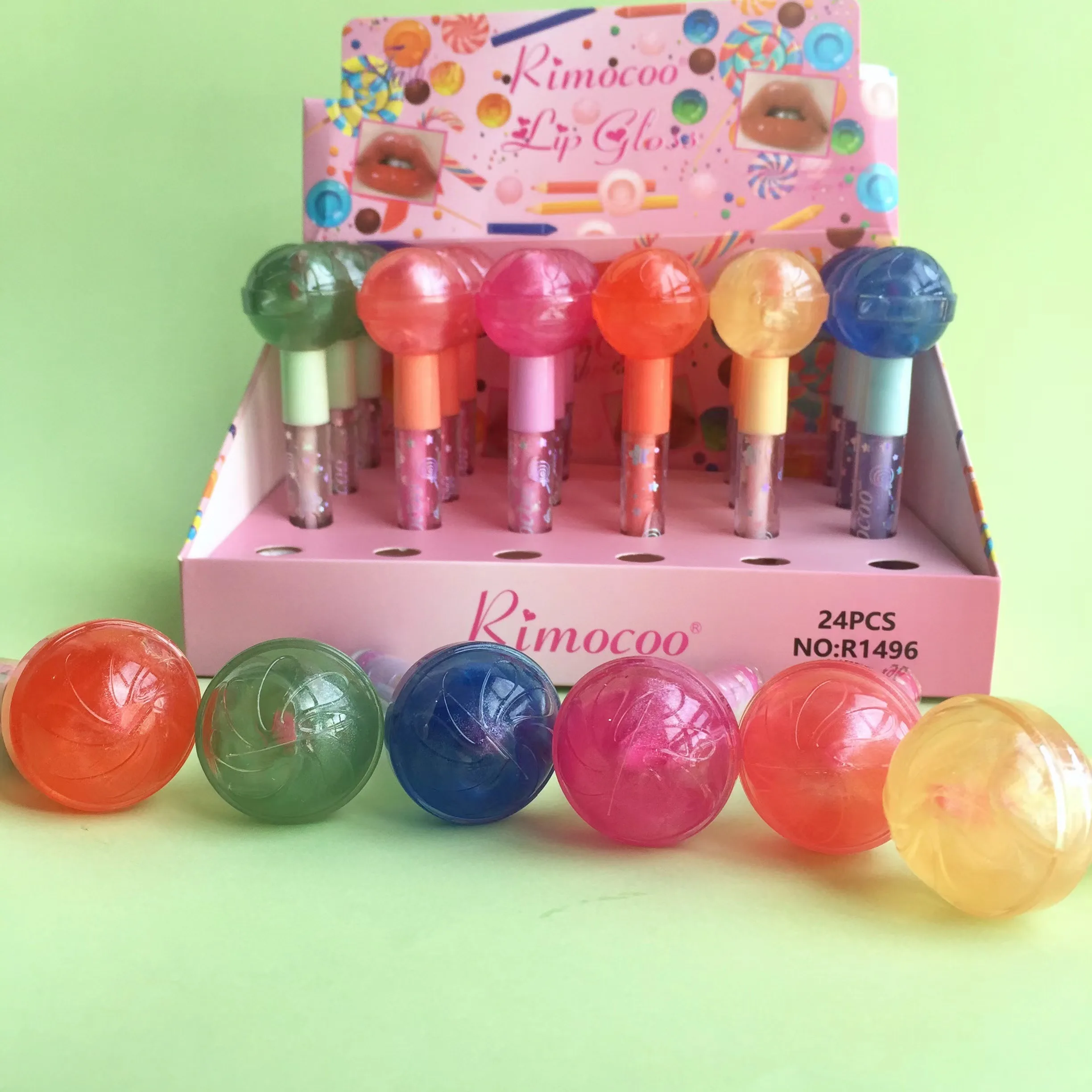 Hot selling candy 24 lollipop lip gloss lip gloss moisturizing glitter waterproof lip oil wholesale