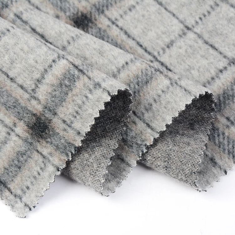 Hot selling vogue winter thick plaid knitted polyester from wasted fishing net recycled flannel fleece velour fabric