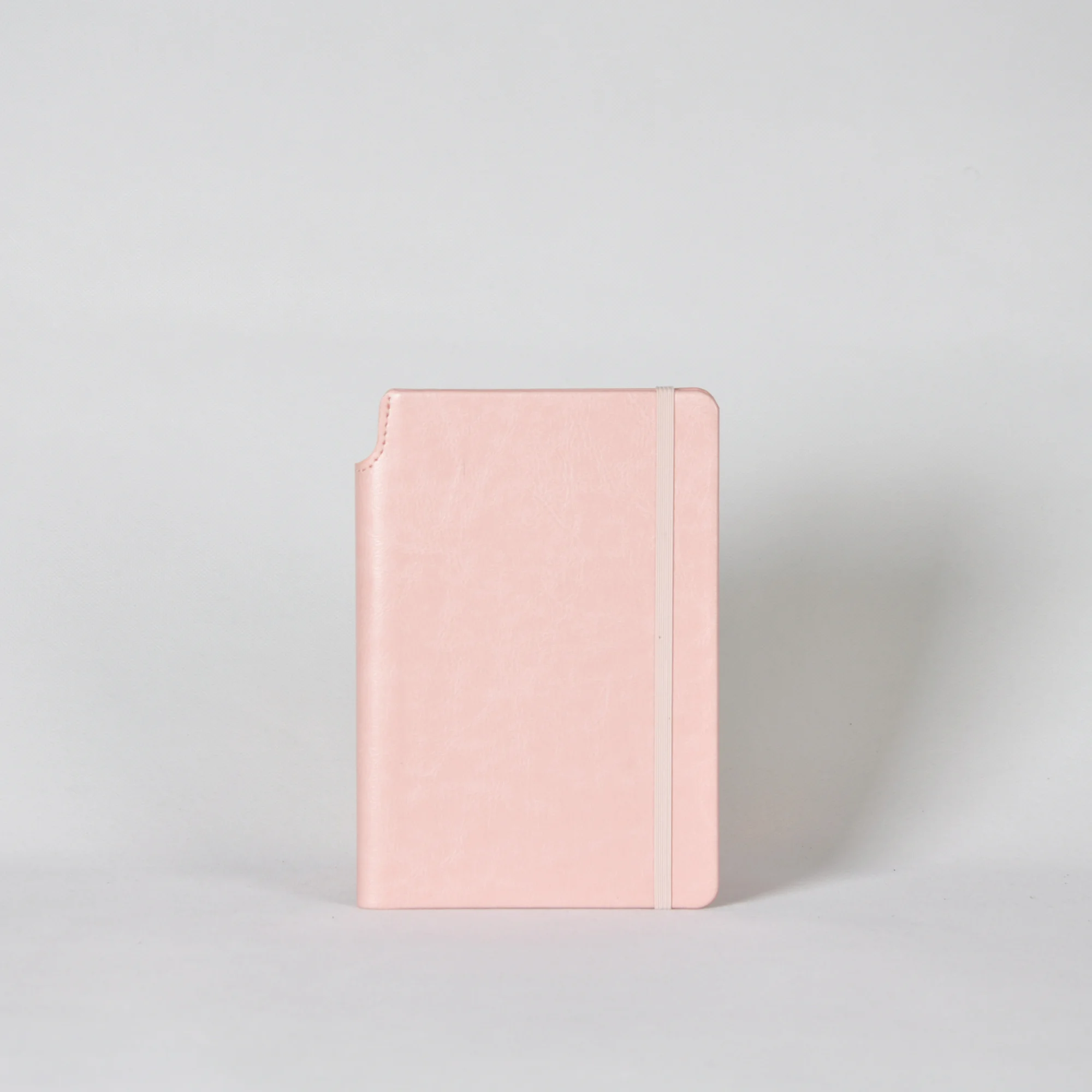 custom sketchbook printing, pink pu leather emboss logo recycled paper notebook b5 a5 with pen loop on cover spine