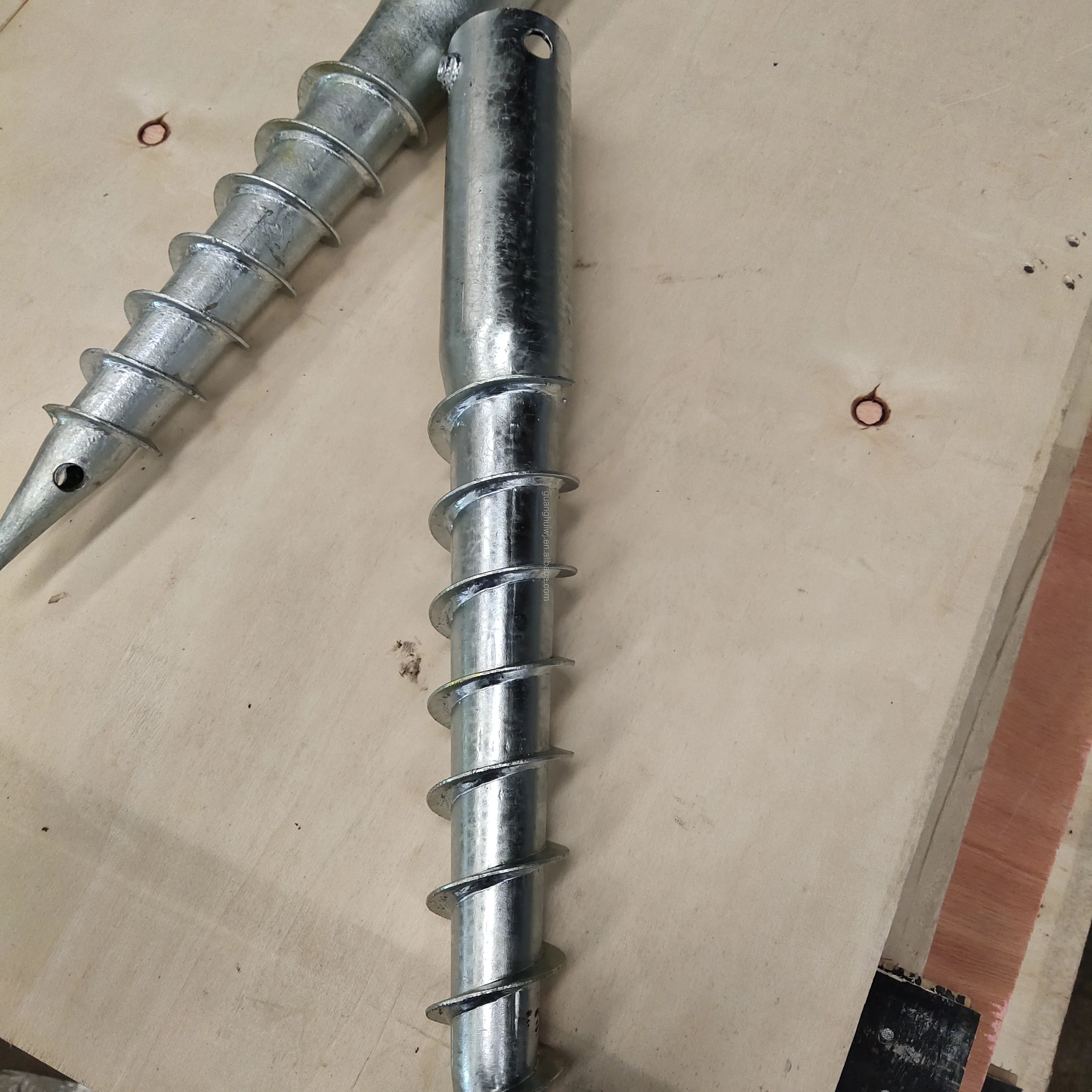 Earth anchor screw piles