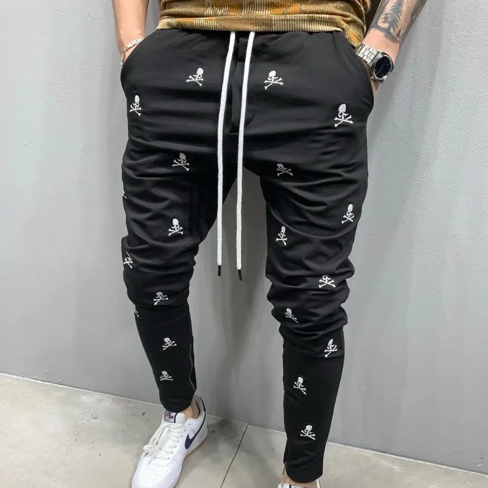 
Muscle hip-hop new fashion embroidery casual self-cultivation trend sports feet zipper trousers men trousers jeans 