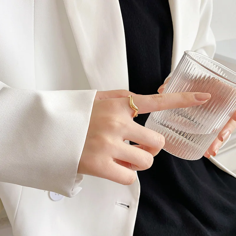 Stainless Steel Ring In 18-Karat Gold Plated With A Minimalist Irregular Fluid Line