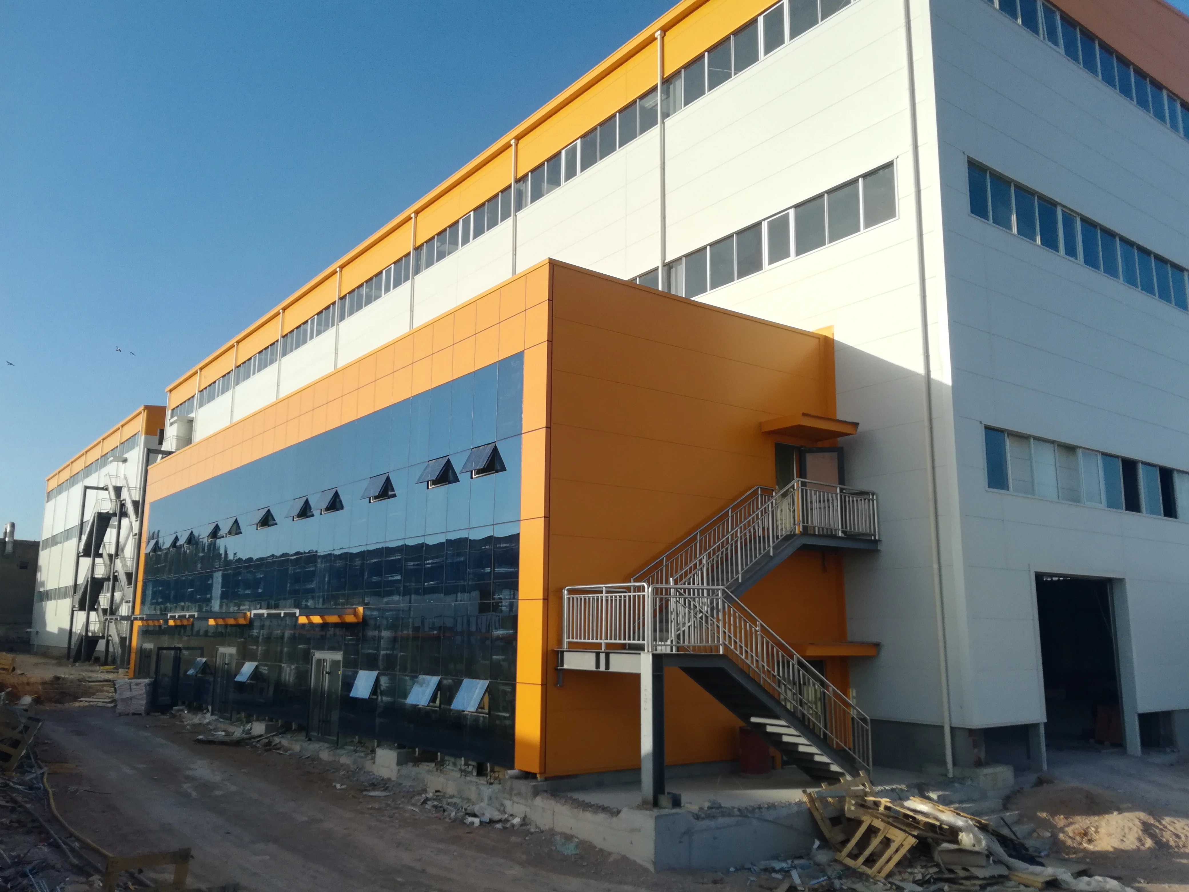 TV Factory Prefab Steel Structure Construction Warehouse Prefabricated Workshop Industrial Shed Free Design Glass Curtain Wall