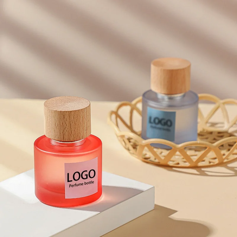 Design Luxury Custom LOGO Fragrance Pump Spray 50ml Round Sprayer Empty Oil Glass Perfume Bottles Packaging