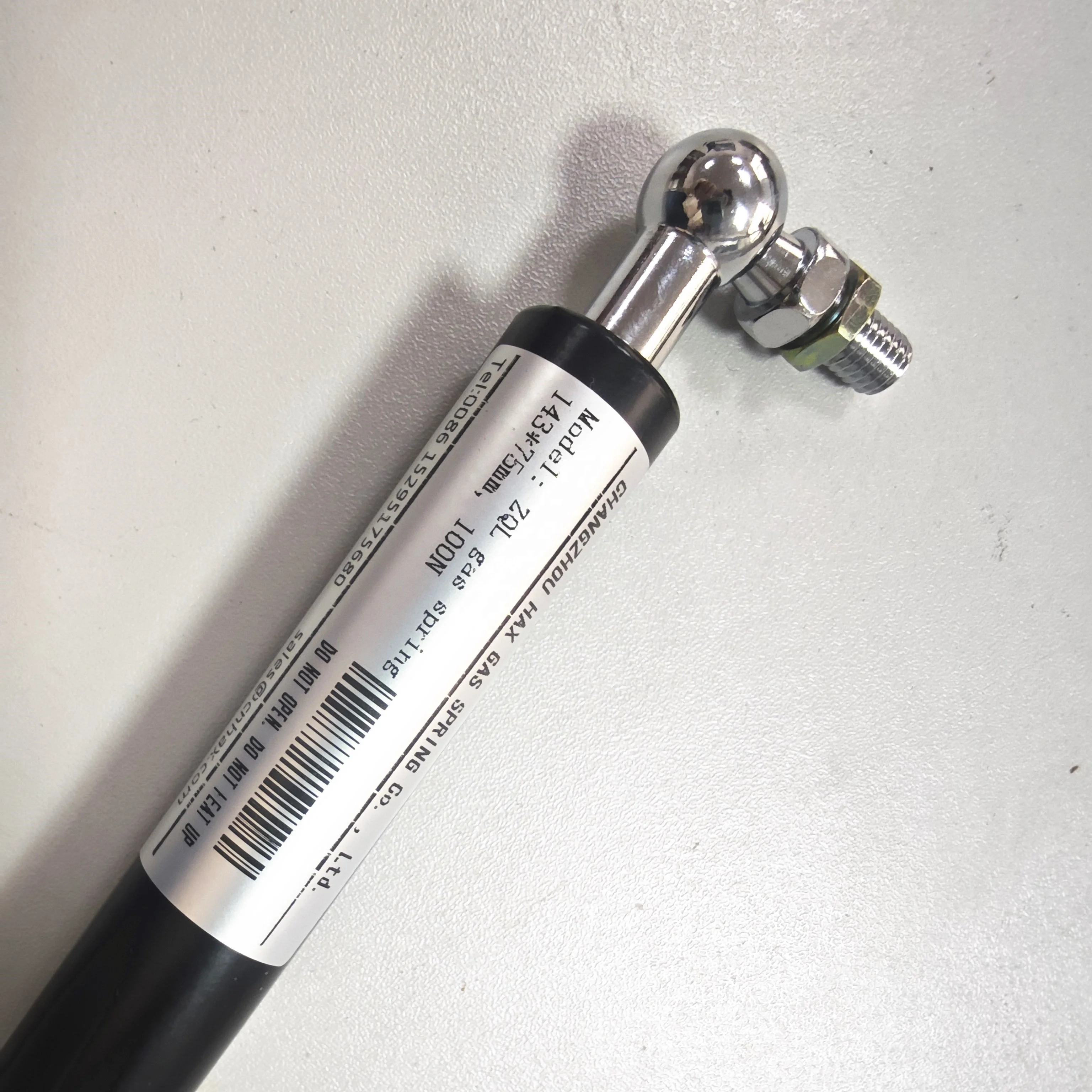 spring-loaded gas spring monitor arm