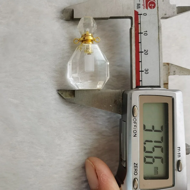 Wholesale natural perfume bottle pendant necklace point shaped crystal quartz essential oil bottles medicine bottle