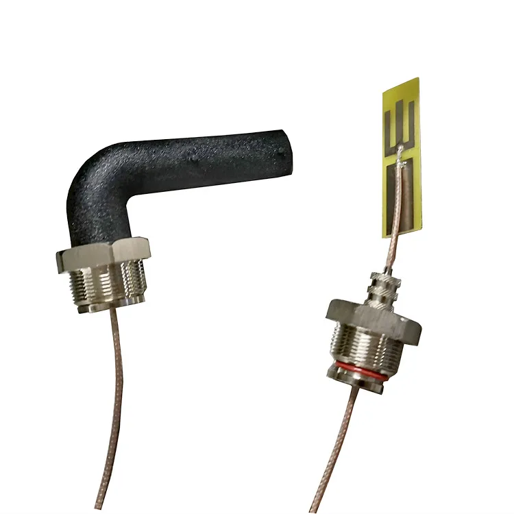Low voltage injection molding of antenna circuit board PA adhesive