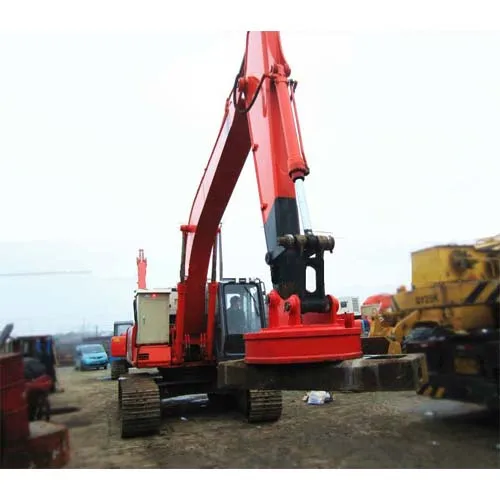 Excavator with Scrap Handling Magnet