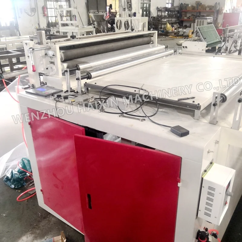 Customer design gridding cutting non woven roll to sheet cutting machine