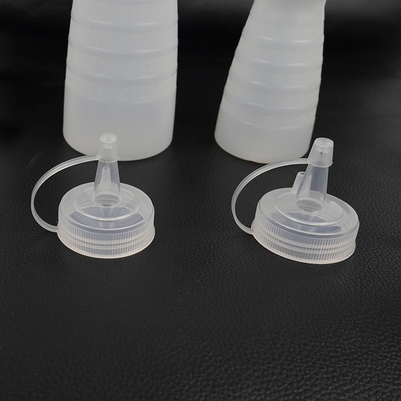 Manufacturer Plastic Thin Waist Squeeze Sauce Bottle Embossed Nozzle Squeeze Pot Jam Tomato Salad Bottle Squeeze Sauce Bottle