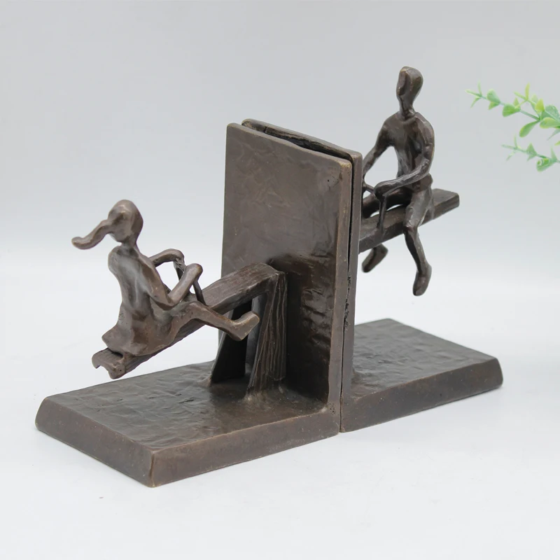 Cast iron sculpture children playing with seesaw bookends figurine For Decor