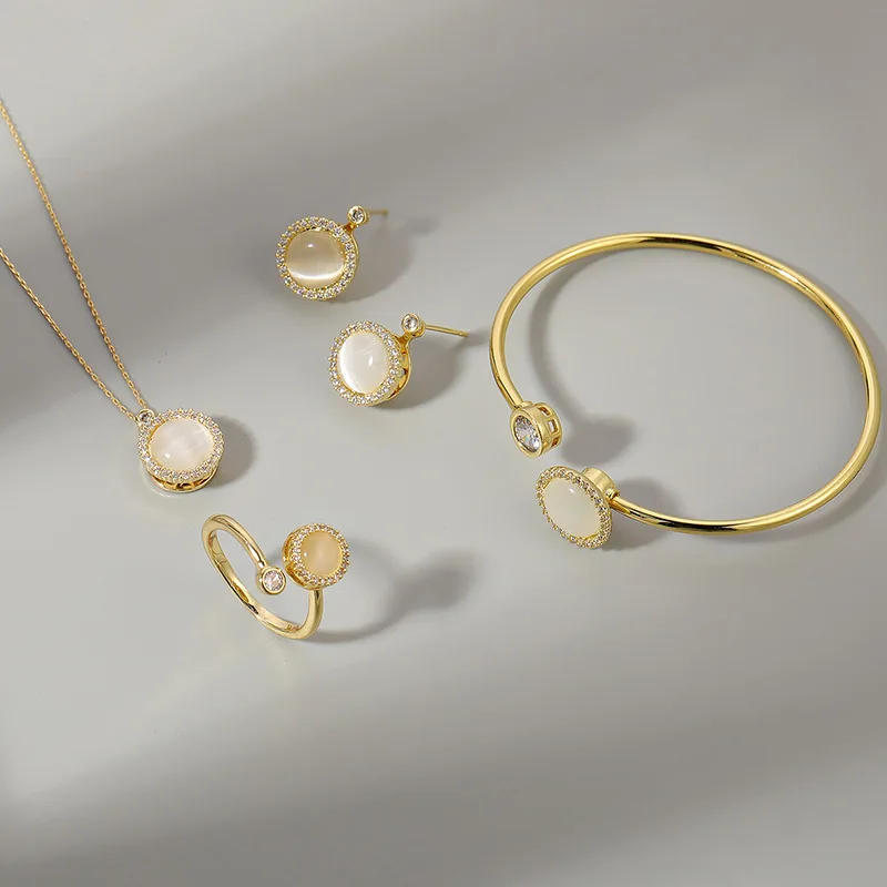 Fashion 18K gold earrings bracelet necklace ring moving rotating decompression jewelry set for wedding