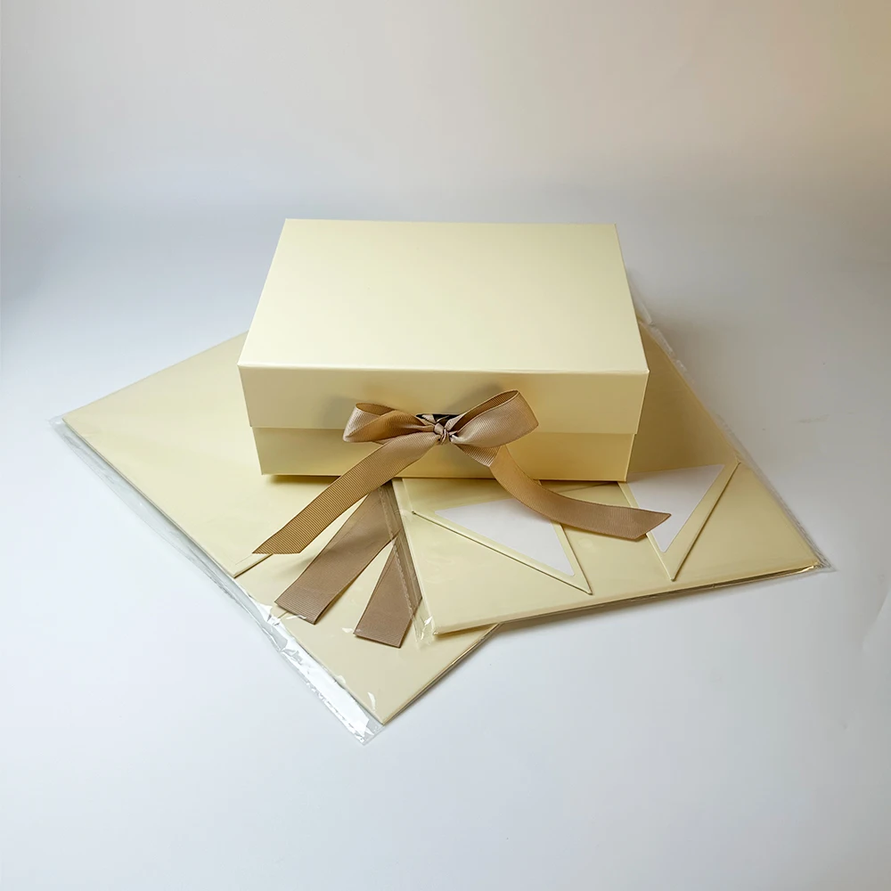 Hot Selling Creative Flap Gift Boxes Magnetic Folding Packaging Boxes UV Bump Design Customized Gift box with Ribbon