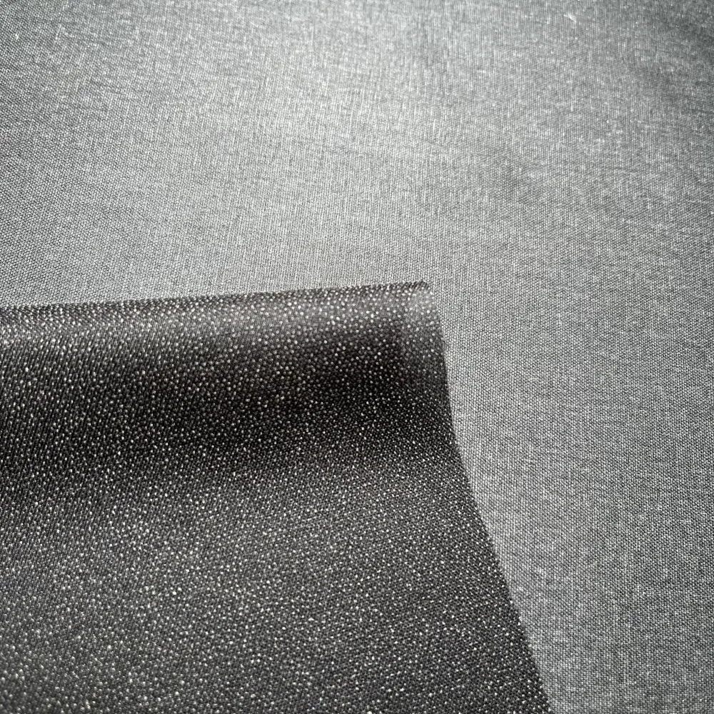Hot Selling 30Gsm 100% Polyester Woven Twill Fusible Water Jet Loom Coat Interlining Fabric