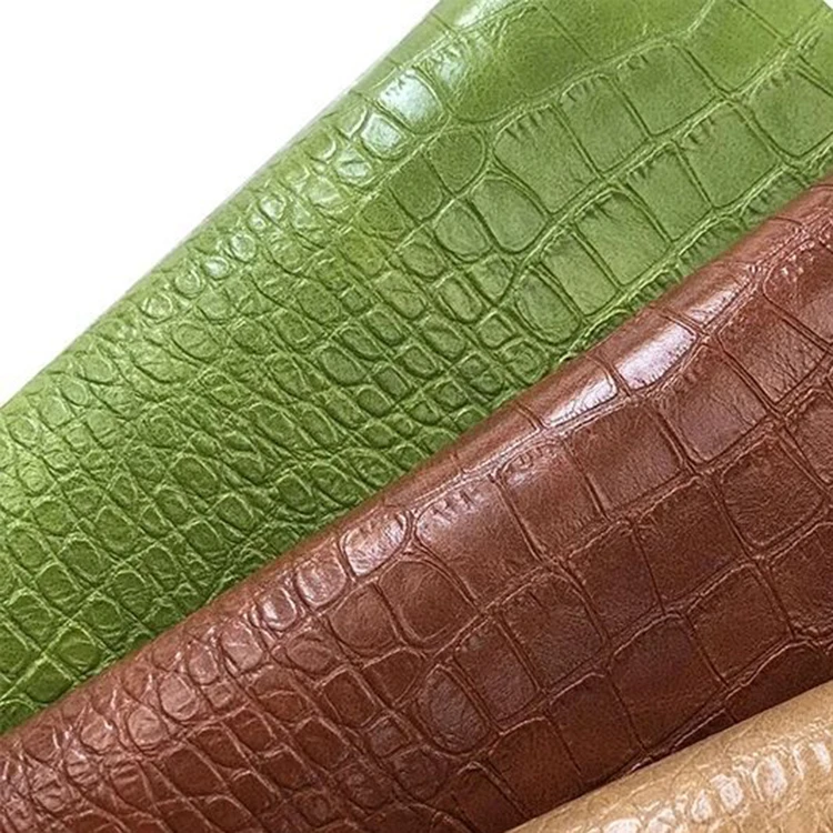 0.8mm crocodile leather Pvc leather knitted backing material durable and modern embossed leather bag