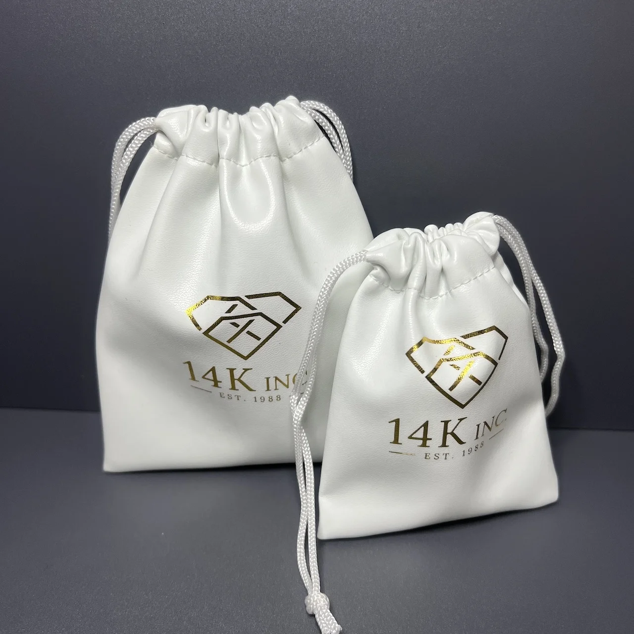 Custom Emboss Logo 7 x 9 cm Luxury Soft PU Leather Drawstring Bag Leather Jewelry Pouch