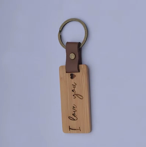 Factory direct selling 100% natural organic cute carving bamboo keychain plus logo key ring tags