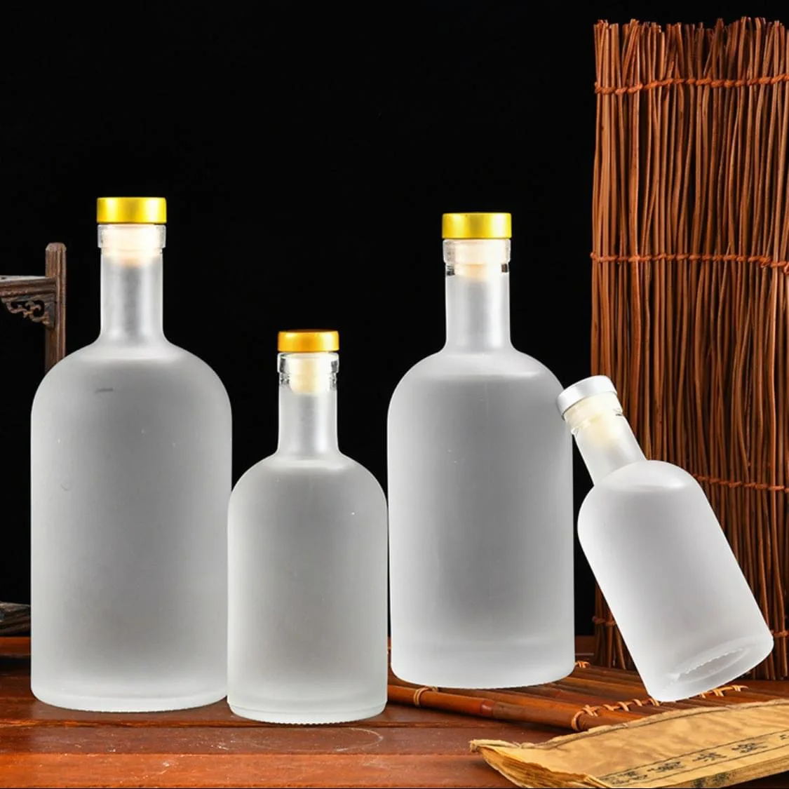 High-end Classic round 500ml 700ml 750ml Vodka glass bottle Frosted Transparent with cap Wholesale Spirits Gin packaging
