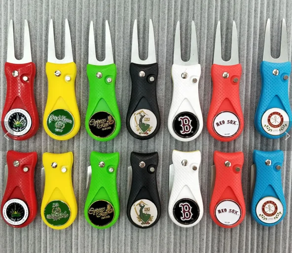 
Switchblade Divot Tool with custom ball marker 