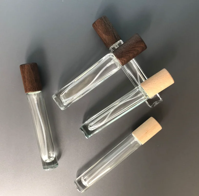 High Quality 10ml portable perfume cosmetics glass bottle with fine mist spray bamboo caps