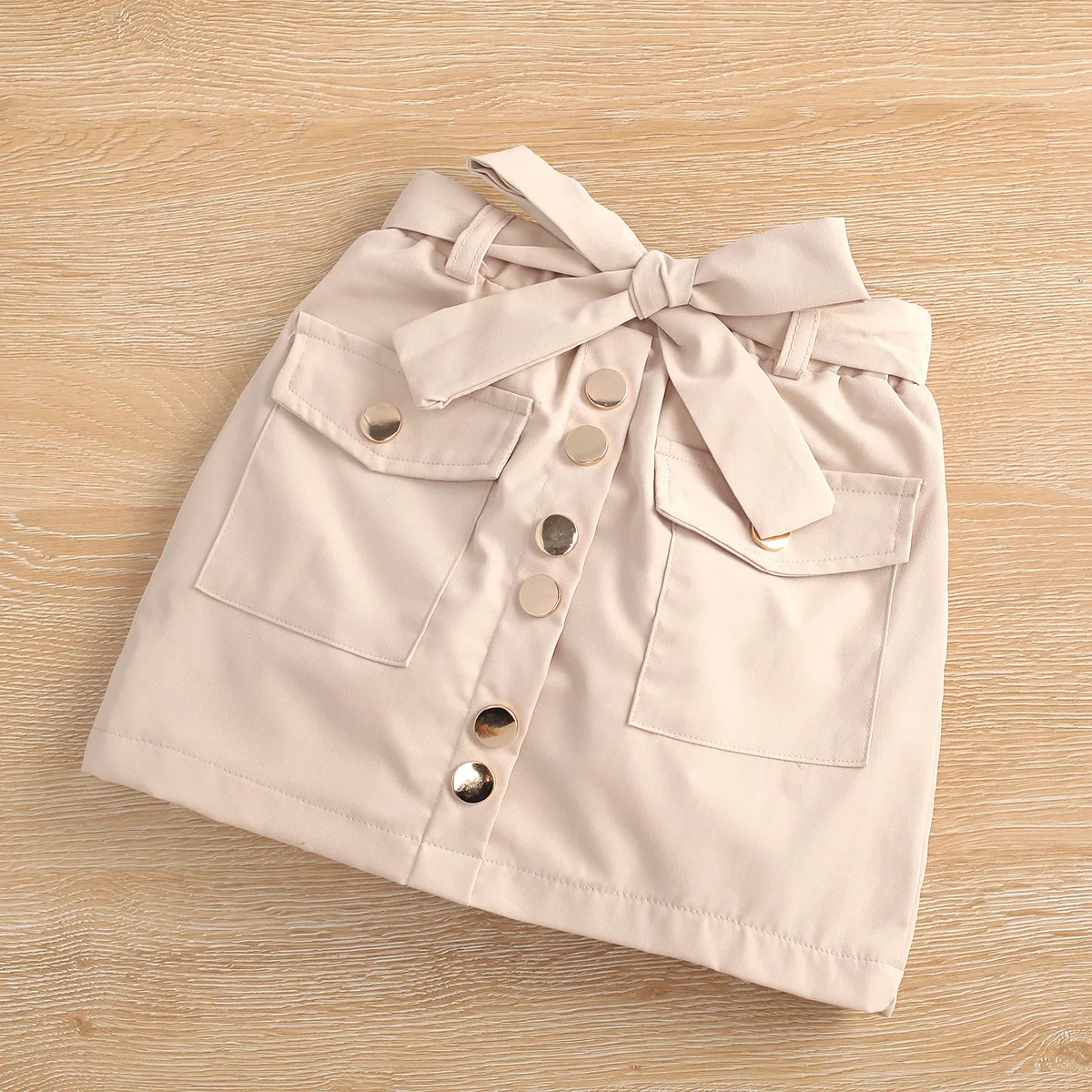 Hot sale American girls Spring and Fall long sleeves lapel jacket 2pcs + bow A- line short skirt suit