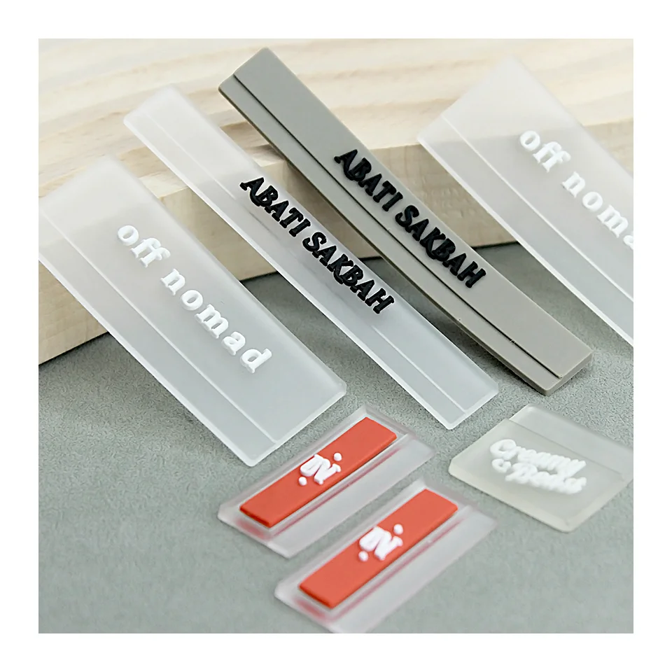 Wholesale Side Raised Seam PVC Patch Customized Brand LOGO Embossed Flag Rubber Sewing on Clothing Transparent Silicon Label