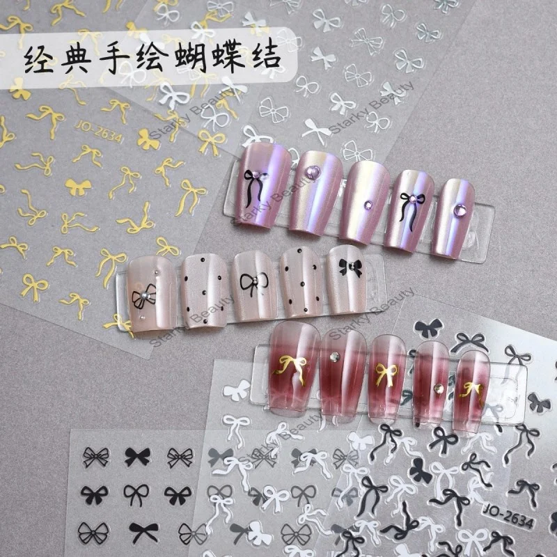 stickers nail China factory hot selling hand-painted nail decals flakes nail art stickers 3d glitter bow decoration