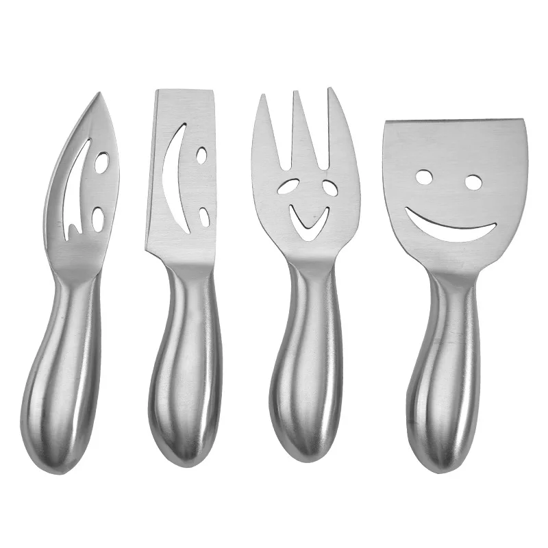Our factory direct selling 4piece 2Cr14 stainless steel smiling face cream cheese knife hollow handle