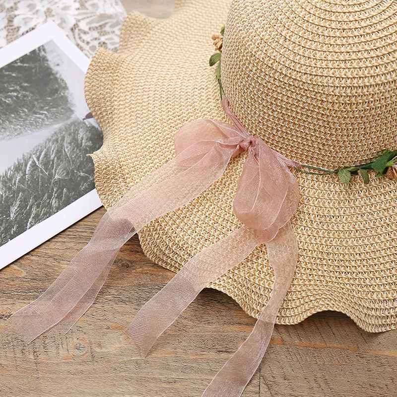 Wholesale Women Summer Wide Wave Brim Flower Beach Fashion Hats Ladies Outdoor Bucket Hat Breathable Sun Straw Hat with garland