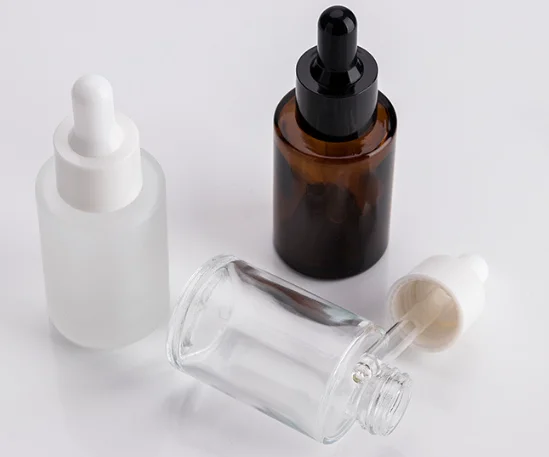 In stock low MOQ 30ml clear face oil  round gold dropper glass bottle