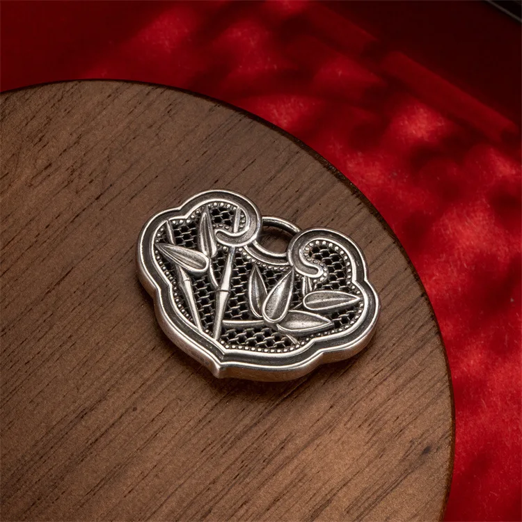 27/5000 Chinese style s999 foot silver bamboo report safety lock pendant leaves ancient style hollowed out one by one