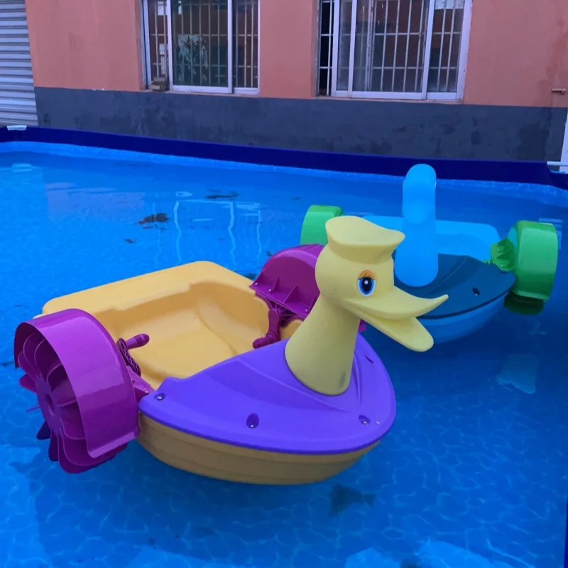 Customized shape swan frog durable HDPE with light mini kids paddle boat for sale