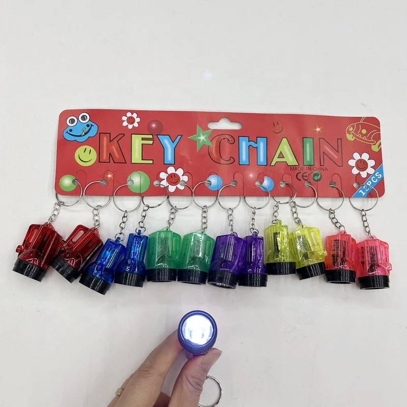 Hot sell Small LED mini key chain novelty flashlight Mini flashlight keychain