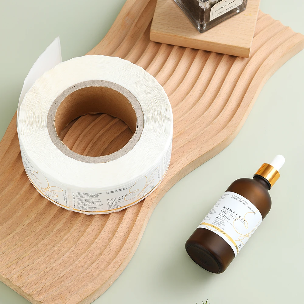 Custom logo printing roll gold foil labels perfume essential oil bottle adhesive paper stickers for packaging