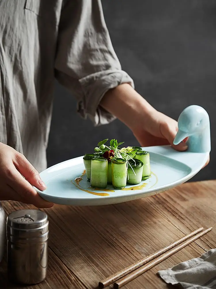 
11/5000 Chinese style is lovely duck modelling irregular ceramic plate modern irregular plates irregular snack plate 