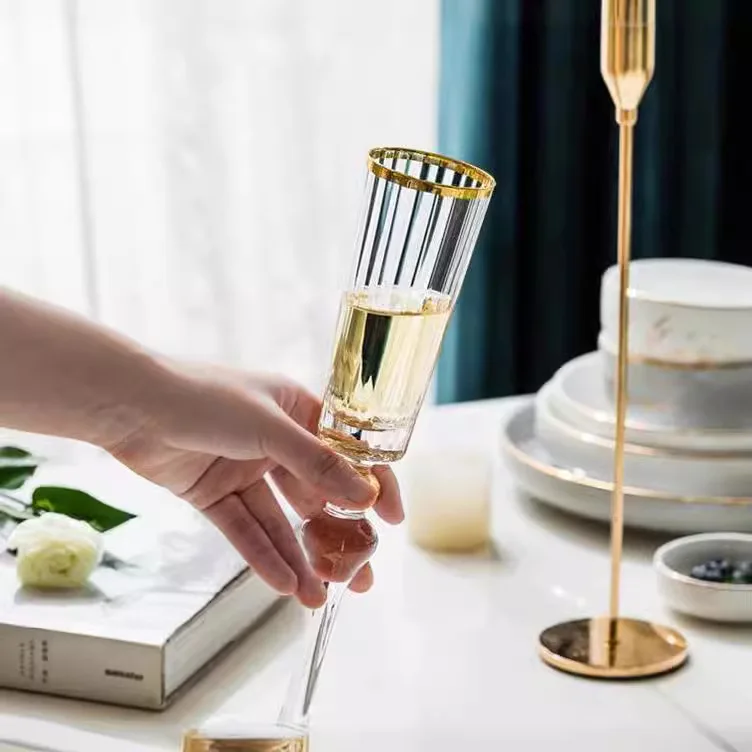 Crystal high ending hand made wine and champagne glasses with pattern design and golden rim and stem daily production items
