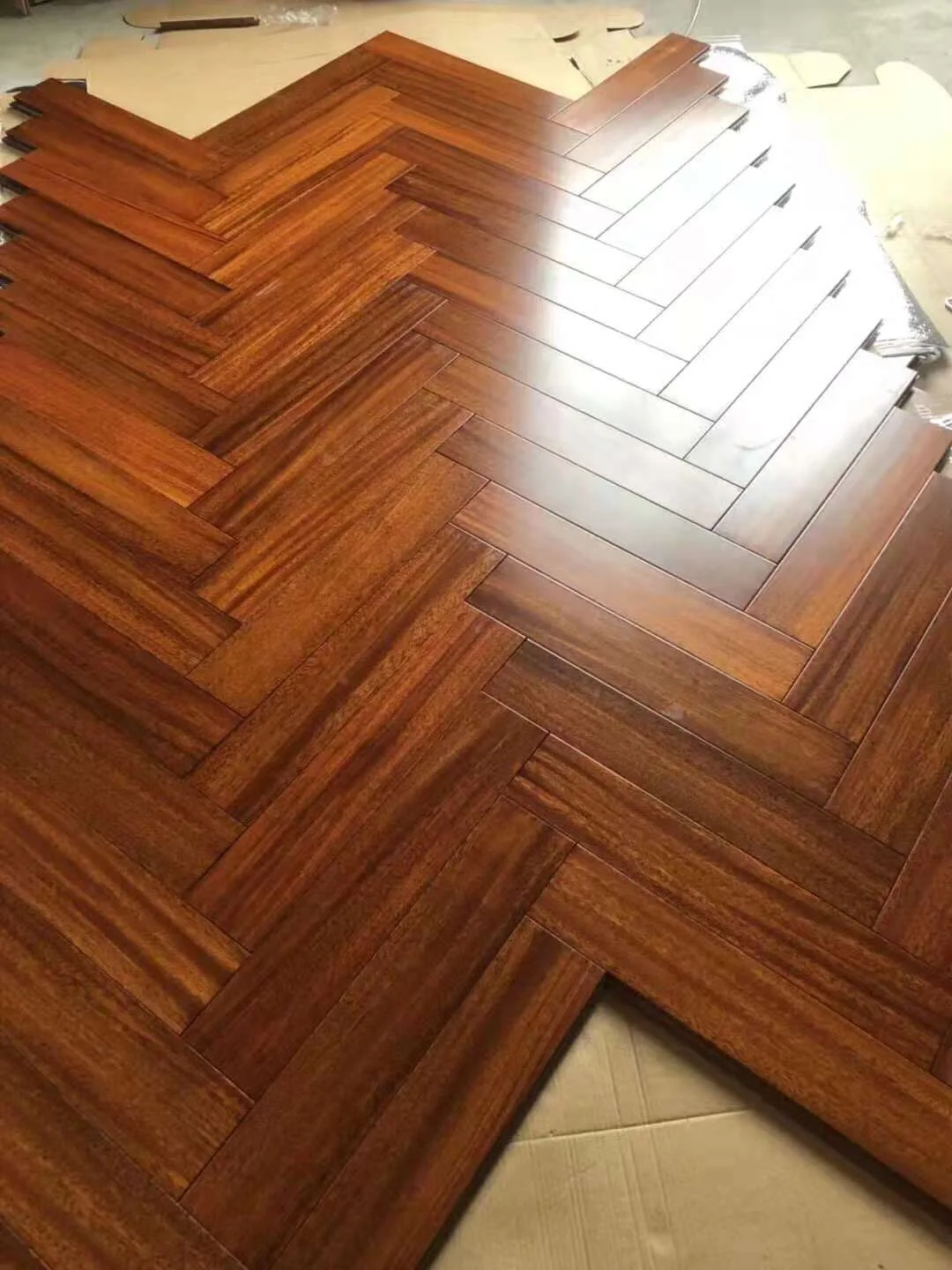 natural UV iroko herringbone parquet wood floor