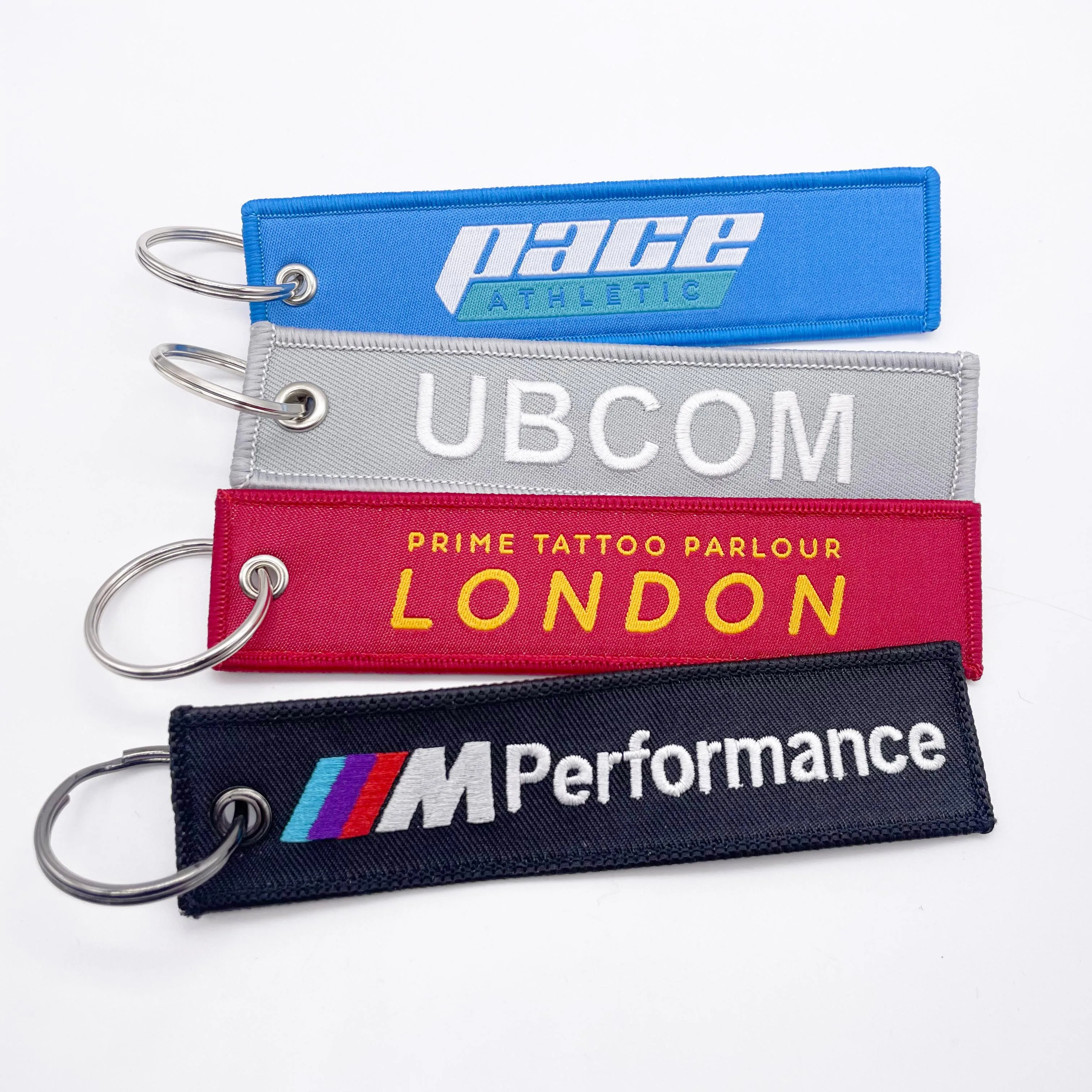 wholesale custom aircraft aviation label key chain fabric Personalized Remove before you fly embroidered key chain rings