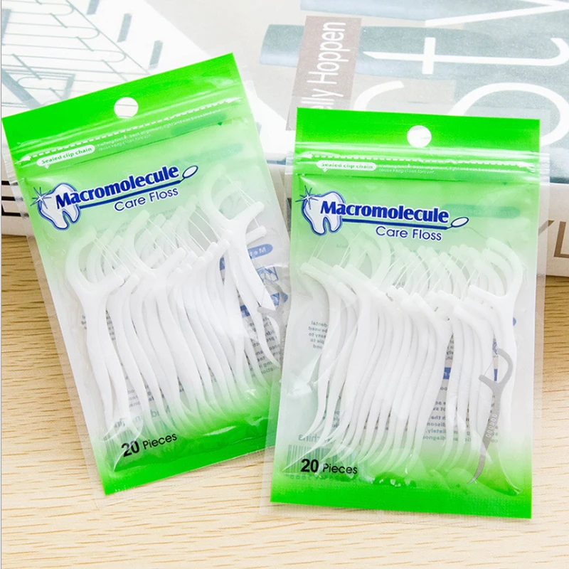 Hot Sale 20PCS Dental floss ultra-fine high tension fine sliding floss stick disposable polymer floss toothpick portable boxODM