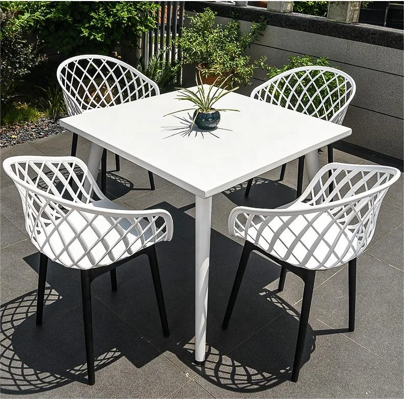 Nordic outdoor modern center hole square table with 4 stackable plastic chairs dining set with umbrella