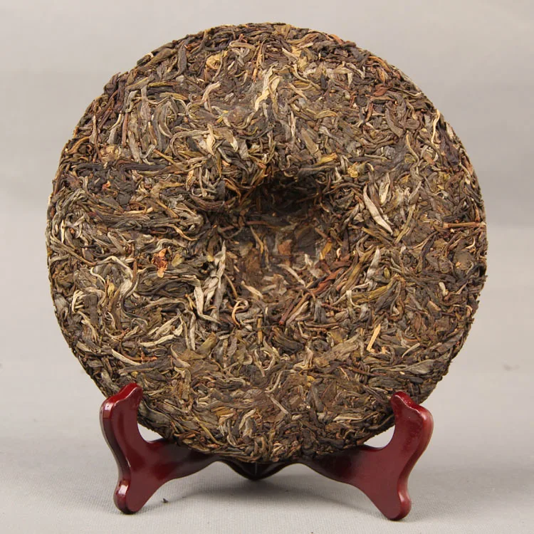 Factory Supply Famous Chinese Puerh Yiwu Ancient Tree  Hand Made Shen Puer Cha Bing Yunnan qi Zi Bing Cha