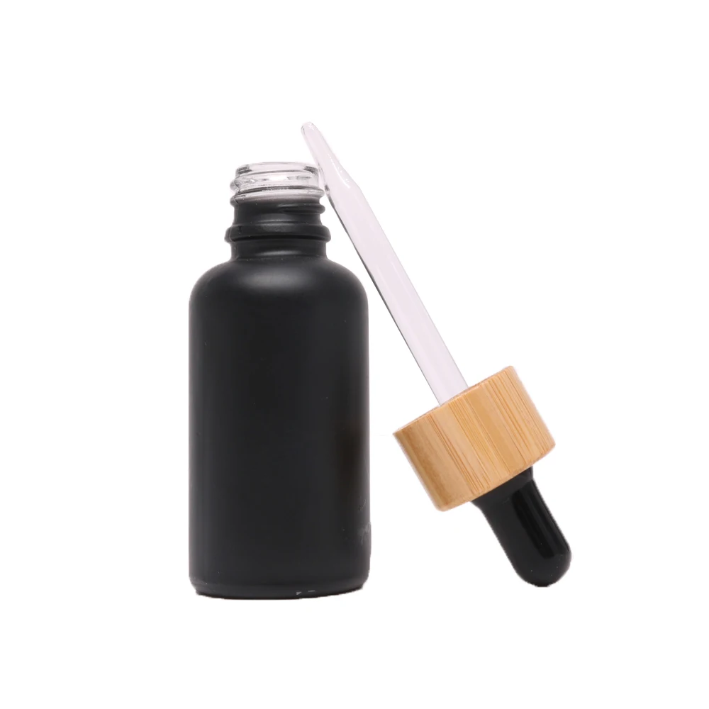black 30ml glass essential oil bottle with bamboo lid dropper