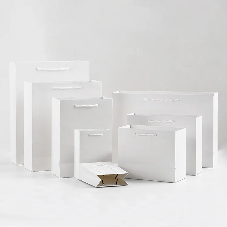 
Promotional wholesale luxury Bags Paper Bags Custom clothing shopping gift packaging paper bag with your own logo 