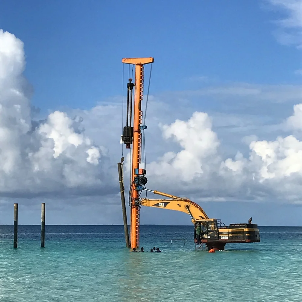 High bed excavator mounted pile driver with diesel pile hammer for resort or wharf project