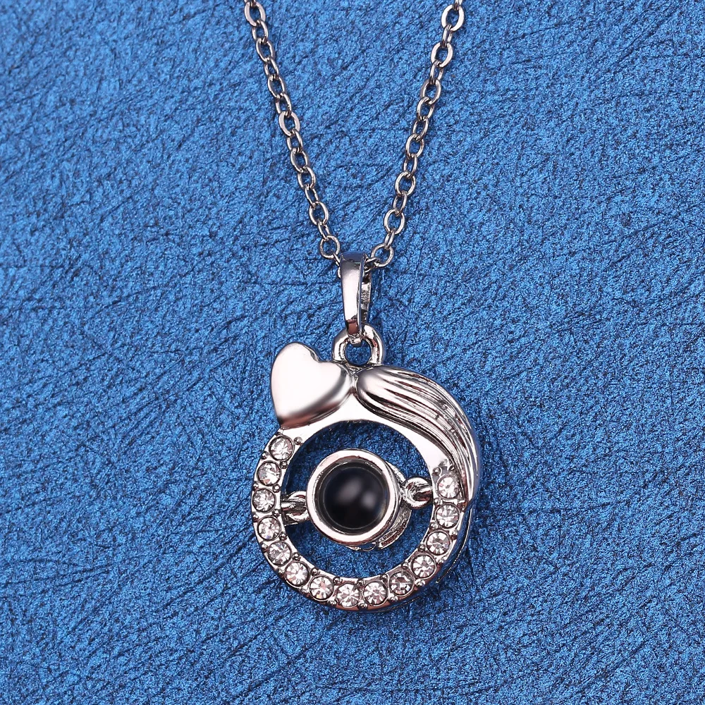 
One hundred kinds of 100 languages I love you necklace Love memory projection necklace female copper necklace jewelry ring 