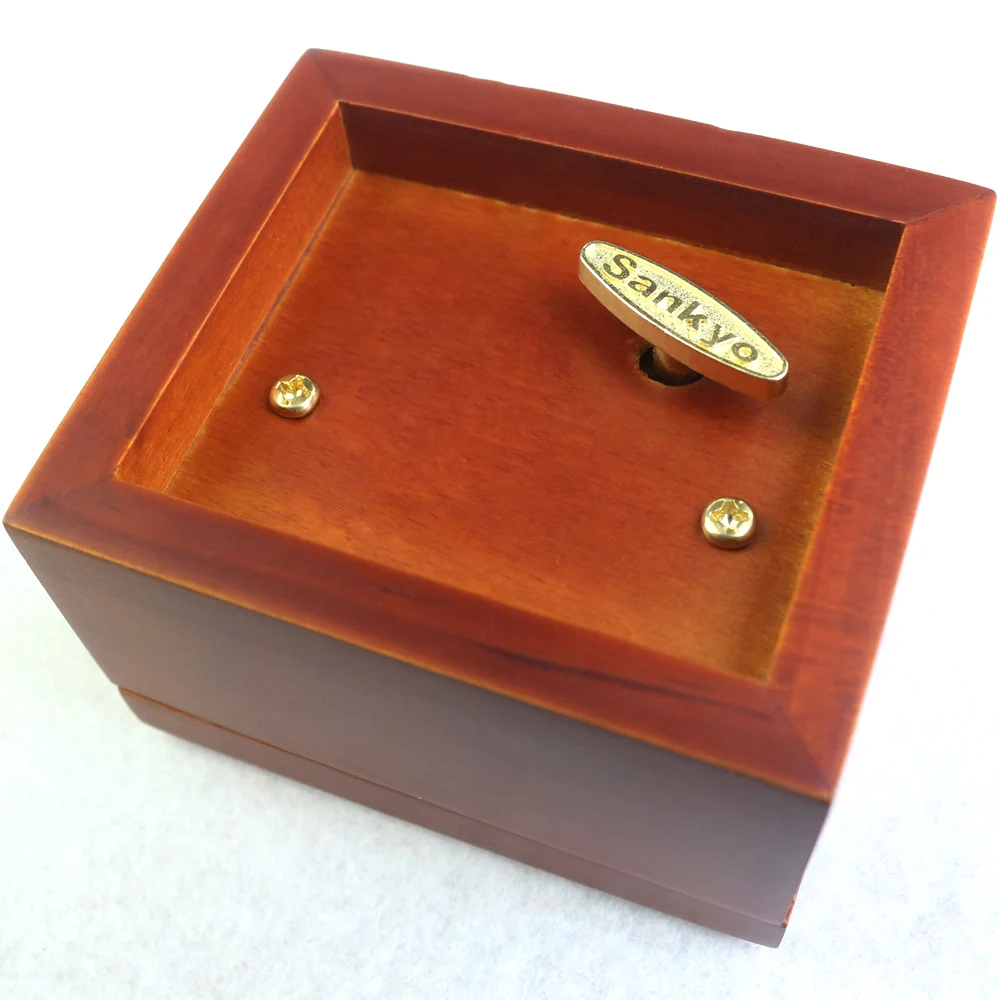 Sinzyo Professional Wholesale Red With Mirror Wooden Music Box Custom Carved Movie Game Pop Melody Music Creative Marketing Gift