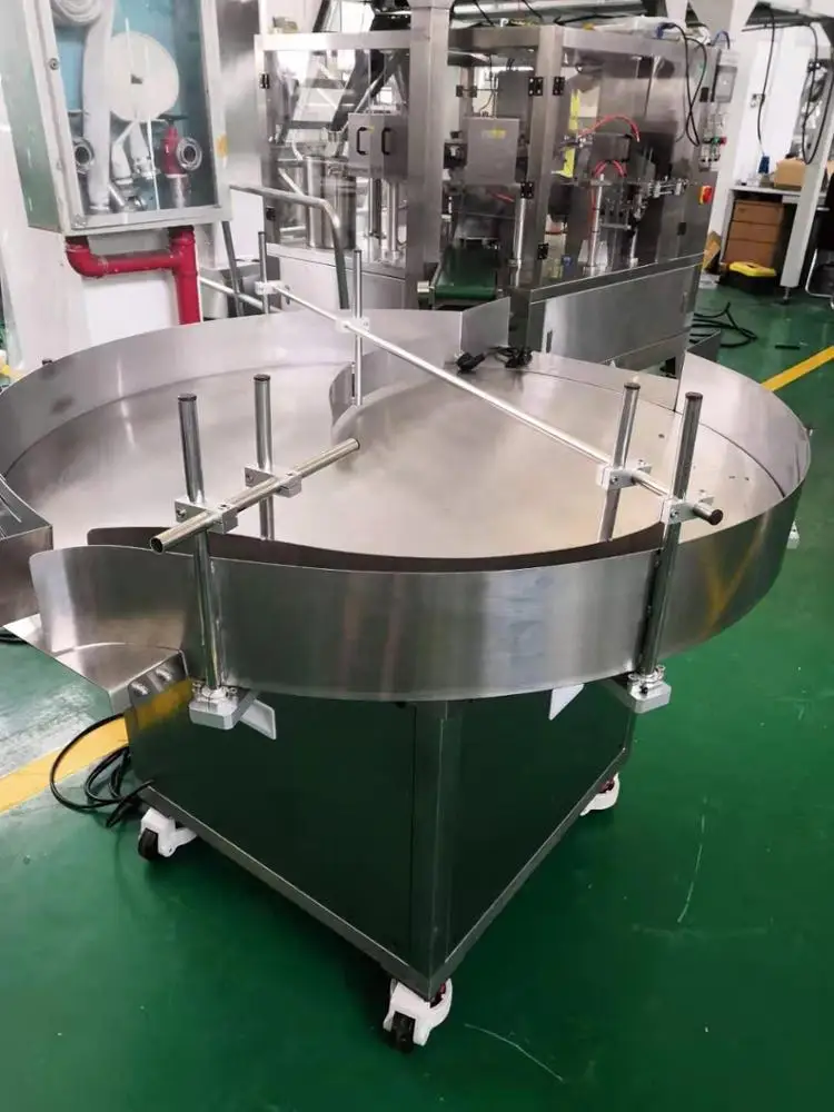 High speed food can/bottle accumulation feeding table