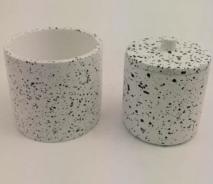 Square concrete candle vessels with marble style surface